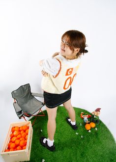 Poses for editorial photoshoot with indoor garden, orange theme, white backdrop. Styled by IG: @wholewheatdanish // photo by IG: @allywei Vest Photoshoot, Crochet Jersey, Theme White, Orange Theme, Orange Crochet, Editorial Photoshoot, Crochet Vest