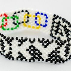 Team Gb Olympics, Kenyan Flag, Maasai People, Mo Farah, Olympic Rings, Bead Charms Diy, Tokyo Olympics, Maasai, Artisan Design