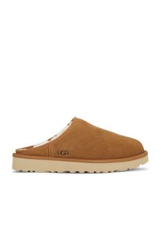 Suede upper with rubber sole.  Made in Vietnam, Fur Origin: Australia.  Dyed fur lining.  Embossed logo detail at side.  .  .  .  .  .  .  .  .  .  .  .  . Ugg Classic, Embossed Logo, Brown Suede, Chestnut, Rubber Sole, Vietnam, Slip On, Great Deals, Australia