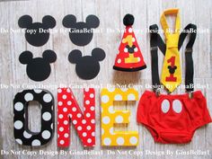 mickey mouse and minnie mouse birthday decorations with the word one for each child's first birthday