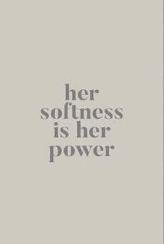 the words her softness is her power are shown in grey on a gray background