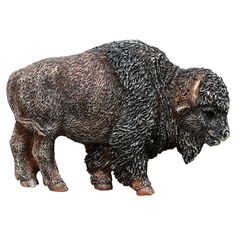 a statue of a bison is shown against a white background