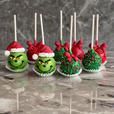 the grin face cake pops are decorated with candy