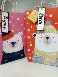 two paper bags with bears on them