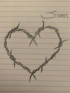 a drawing of barbed wire in the shape of a heart with words hopes written on it