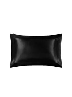 a black pillow on a white background with no one in the room to see it