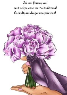 a hand holding a bouquet of purple flowers with the words happy mother's day on it