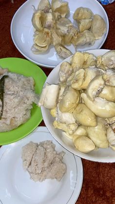 three plates with different types of food on them