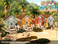 there are many colorful beach huts in the background with palm trees and flowers around them