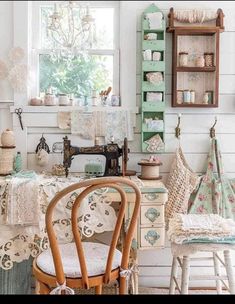 a room filled with lots of different types of furniture and decor on top of wooden shelves