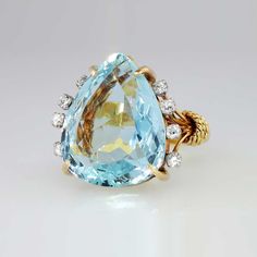 Fantastic 1960's ring made entirely in 18k yellow gold in pristine vintage condition. It features a natural aquamarine and is adorned by eight single cut diamonds Bijoux Art Deco, Bling Ring, Jewels Rings, Aquamarine Jewelry, Retro Jewelry, Bling Rings, Natural Aquamarine, Gorgeous Jewelry, All That Glitters