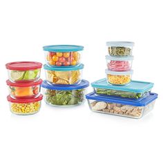 tupperware containers filled with various types of vegetables and fruits, all stacked together