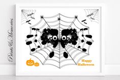 a halloween card with an image of two spider webs and pumpkins on it