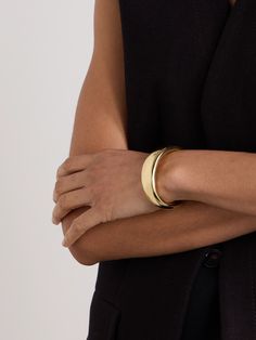 LIÉ STUDIO's chic, timeless jewelry will work effortlessly with any outfit. This 'The Emma' cuff is made from polished gold-plated metal and has a wide shape that tapers gently at the sides. Our edit includes a silver version, too. Daily Uniform, Flat Dress Shoes, Gucci Eyewear, Raffia Bag, Gold Bracelet Cuff, Skincare Tools, Fine Watches, Timeless Jewelry, Silver Cuff Bracelet