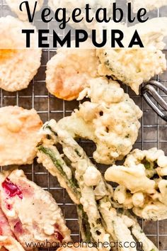 an image of vegetable tempura on a wire rack