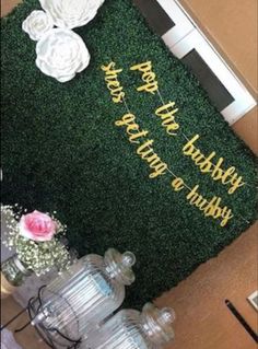 there are flowers and vases sitting on the floor next to a door mat that says, don't try my birthday today