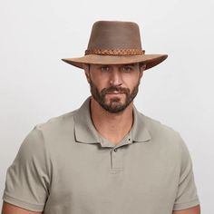 Breeze | Mens Wide Brim Sun Hat offers ultimate sun protection and water resistance with a UPF 50 rating. Made from lightweight cowhide leather and breathable mesh, this medium-brim outback hat is perfect for men seeking comfort and durability in the sun. Material: Lightweight Cowhide Leather and Polyester Mesh Shape: Outback Trim: Braided Leather Band with Side Tassel Brim Size: 2 3/4” Crown Height: 3 3/4” Features: UPF 50 Protection, Water-Resistant, and Adjustable Chin Cord Sweatband: AHM Vel American Hat Makers, Outback Hat, Mens Sun Hats, Wide Brim Sun Hat, Braided Leather, Sun Hat, Wide Brimmed, Leather Band, Upf 50