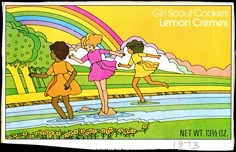 an old postcard features two girls playing in the water with a rainbow behind them