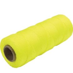 neon yellow spooling thread on white background