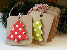 three tags with christmas trees on them