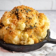 a close up of food in a pan on a table