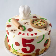 a birthday cake with the number five on it