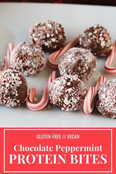 chocolate peppermint protein bites on a plate with candy canes