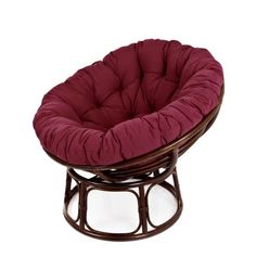 a round chair with a red cushion on it's back and seat pad in the middle