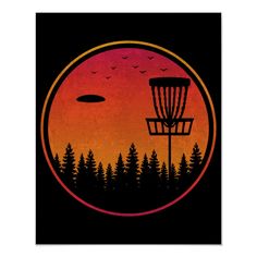 a disc golf goal with trees in the background and birds flying over it at sunset