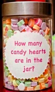 a jar filled with lots of candy sitting on top of a table