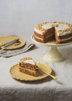 there is a piece of cake on the plate and another slice has been taken out