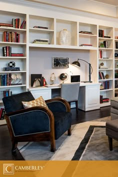 a living room filled with lots of furniture and bookshelves on top of shelves