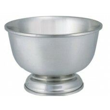 a large metal bowl on a stand