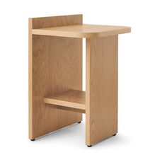 a small wooden table with one shelf on the side