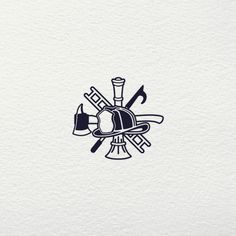 the logo for an artisan shop with tools and paintbrushes on white paper