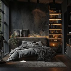 a bedroom with black walls and flooring is lit up by lights from the bookshelves