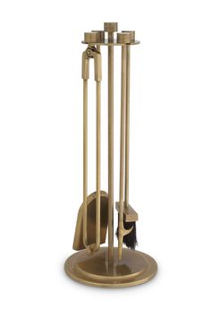 a metal rack with two brooms and one duster