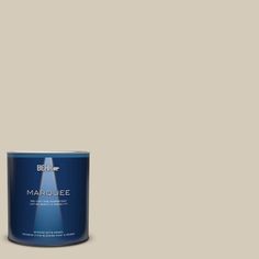 a white paint can with the words marjoie on it and a blue tin