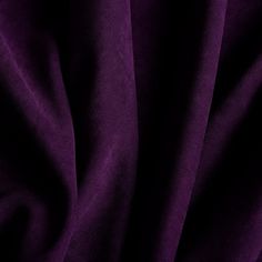 a close up view of purple fabric