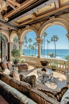 a large living room with an ocean view