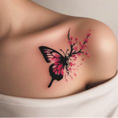 a woman's shoulder with a butterfly and flowers tattoo on her left side breast