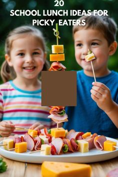 two young children eating food on sticks with the words school lunch ideas for picky eaters