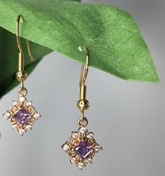 Lab created cz crystal.  Gold plated earring hooks.  Beautiful purple color.  Made with passion and love by seller.  Thank you. Luxury Lavender Gemstone Earrings, Formal Jewelry, Prom Earrings, Purple Jewelry, Earrings Purple, Purple Earrings, Jewelry Lookbook, Dangly Earrings, Earring Hooks