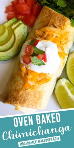 an enchilada with cheese, sour cream and avocado on top