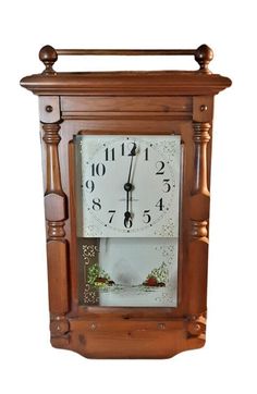 an old wooden clock with roman numerals on the face and hands, is shown against a white background