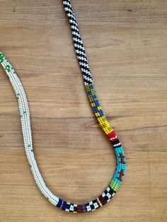 I absolutely adore making these colorful rope strands! Each bead is like a meditation for me. They take time, and I take care to stitch each bead, picking the individual colors as I like. They feel so soft in hand and bring joy and interest to anyone who sees them! This particular necklace measures approximately 13" long doubled, 30.5" circular. It fits over your head so no clasps! Just a simple, beautiful accessory that will liven up any outfit. Necklace Colorful, Colourful Necklace, Glass Bead Necklace, Beaded Jewelry, Beading, Glass Beads, Beauty Book, Meditation, Beaded Necklace