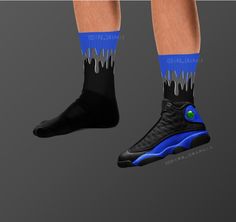 These Jordan 13 Retro 'Hyper Royal' inspired all-over-print socks are extra comfortable thanks to their cushioned bottom. The foot is black with artwork printed along the leg with crisp, bold colors that won't fade.  * 60% nylon/22% cotton/18% spandex * Crew length * Cushioned bottom * Ribbed leg * Cold wash with like colors and hang dry * A great year-round gift idea with graphics inspired by the Jordan 13 Retro 'Hyper Royal' colorway! * Perfect gift for any sneakerhead! * The Jordan 13 Retro ' Blue Sports Socks, Blue Non-slip Sporty Socks, Sporty Non-slip Blue Socks, Blue Non-slip Casual Socks, Casual Blue Non-slip Socks, Casual Black Socks For Sports Events, Black Non-slip Socks For Sports, Black Non-slip Socks For Sports Events, Casual Blue Socks For Sports Events