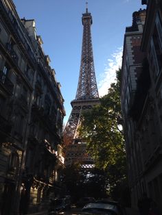 the eiffel tower towering over other tall buildings