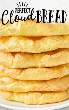 the perfect cloud bread is stacked on top of each other in front of a white plate