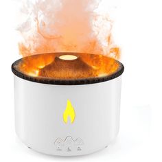 a white and black stove with flames coming out of it's back end on a white background